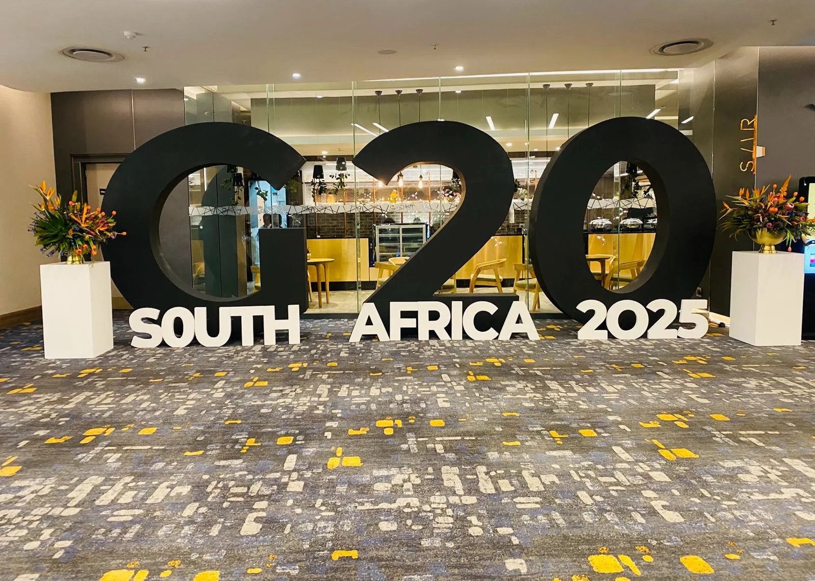 G20 South Africa 2025 signage in a summit venue